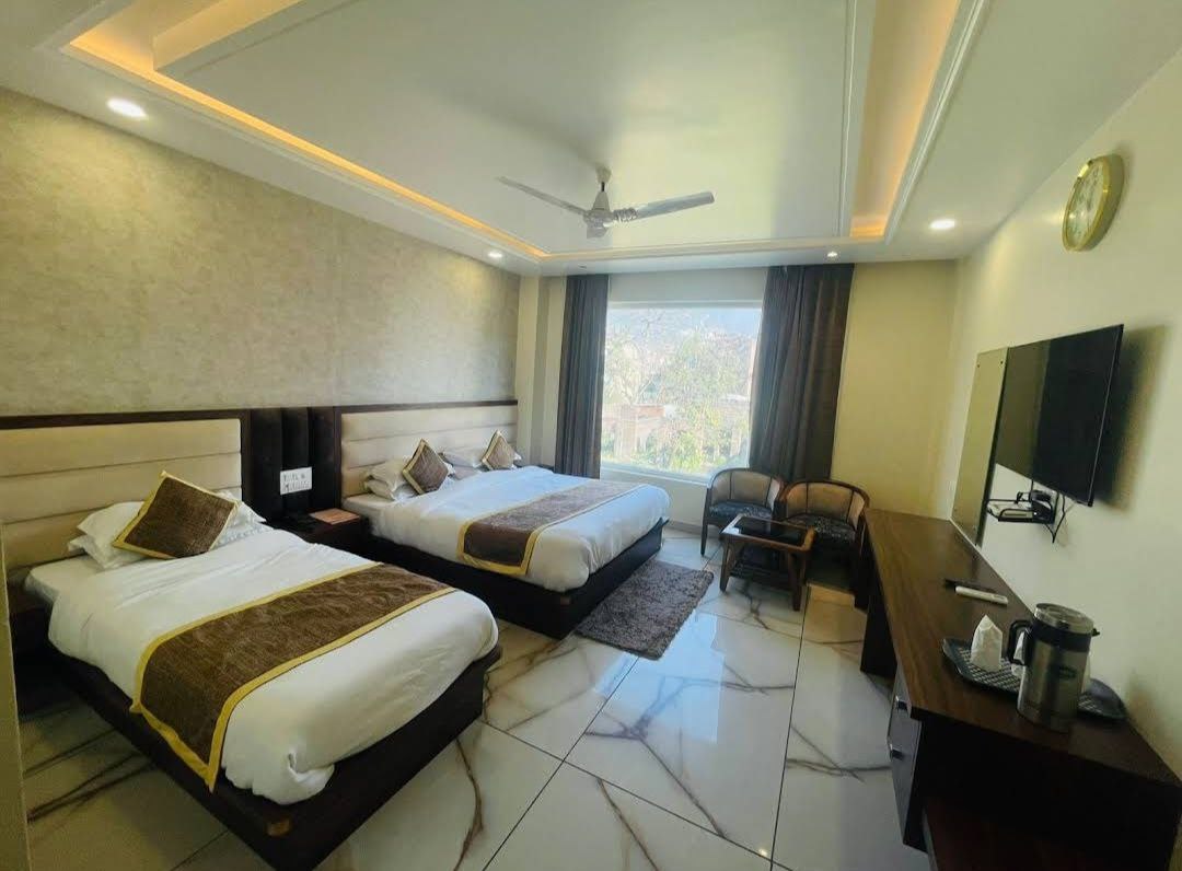 Triple bed room at Niharika Bhavan suitable for three persons